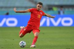Aaron Ramsey playing for Wales